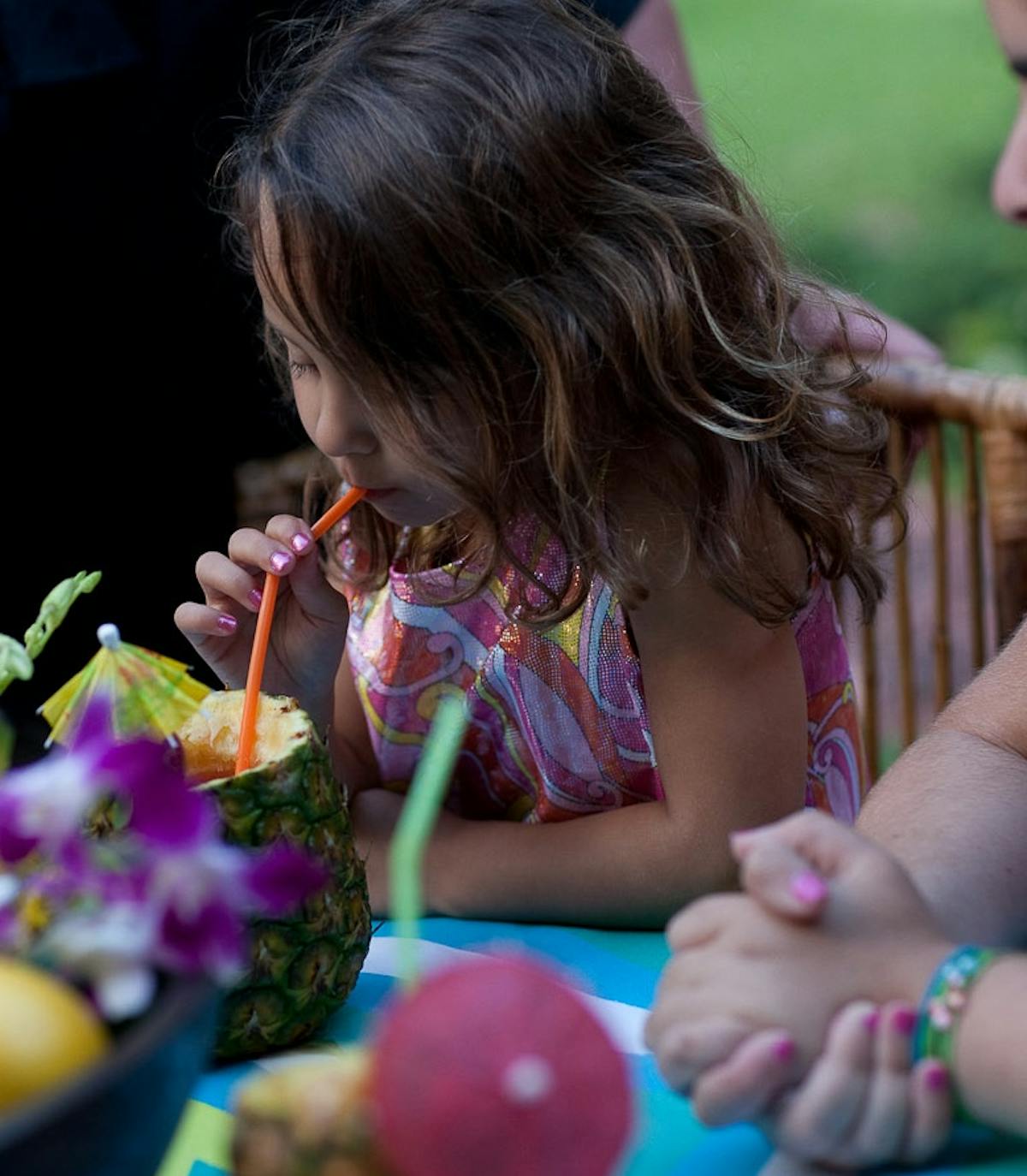 a little girl that is eating some food