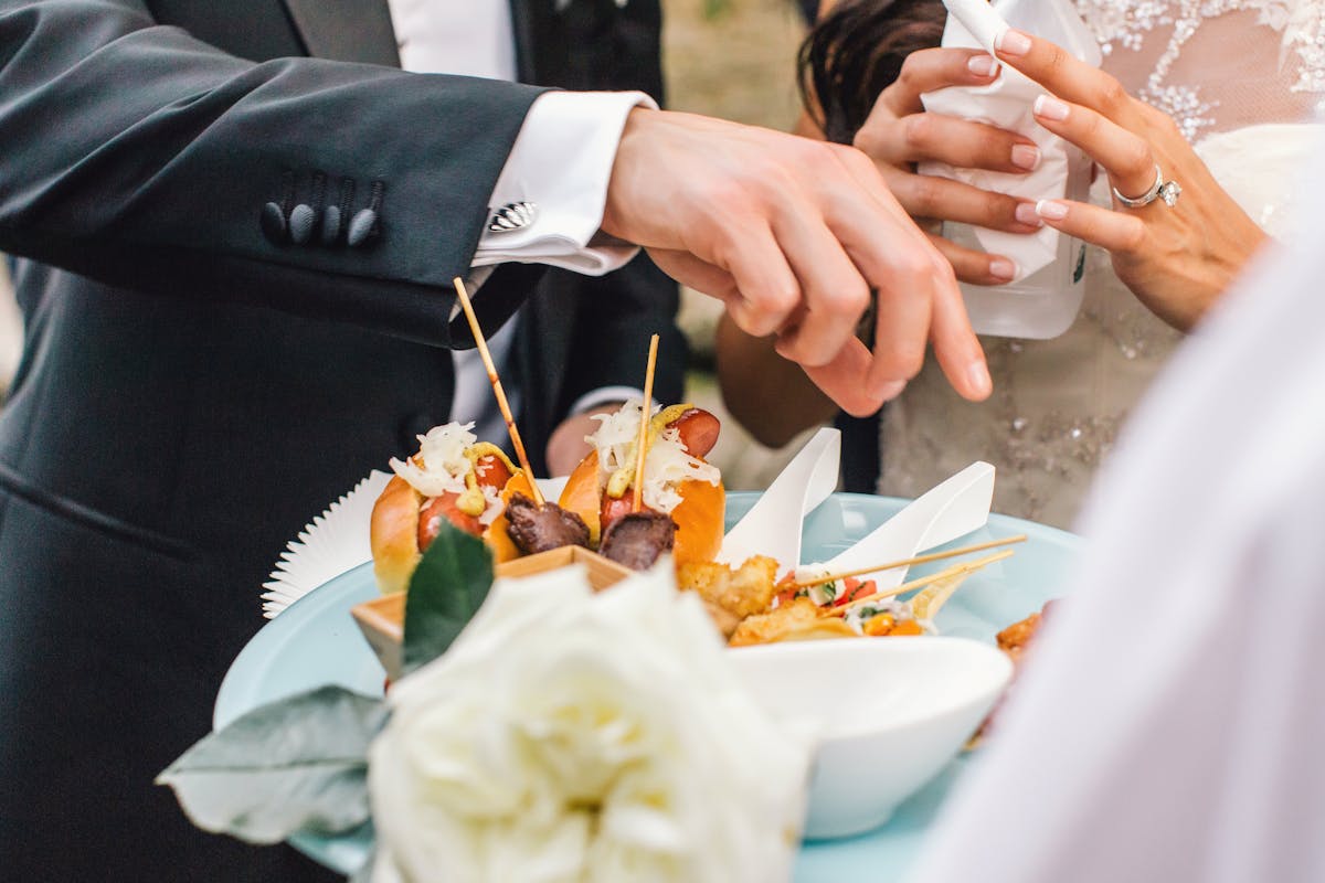 a woman sitting at a table eating food