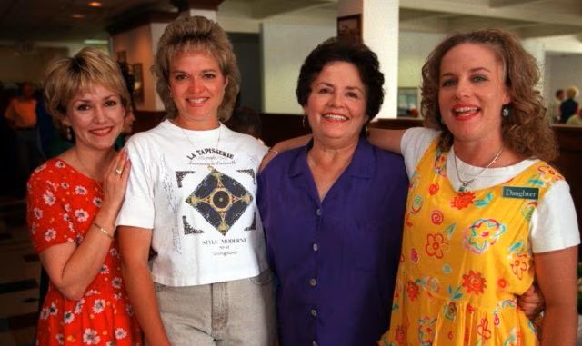 a group of people posing for a photo