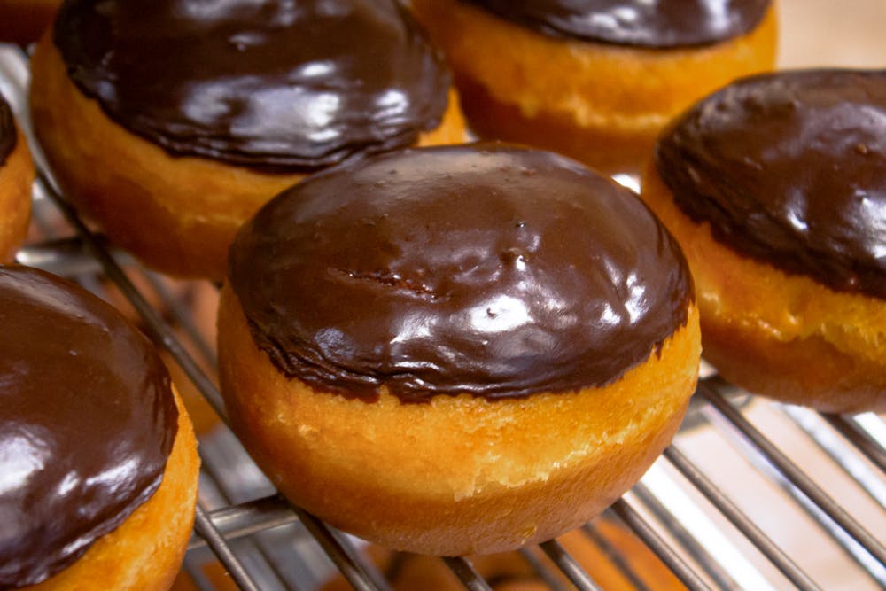 a close up of a doughnut on a plate