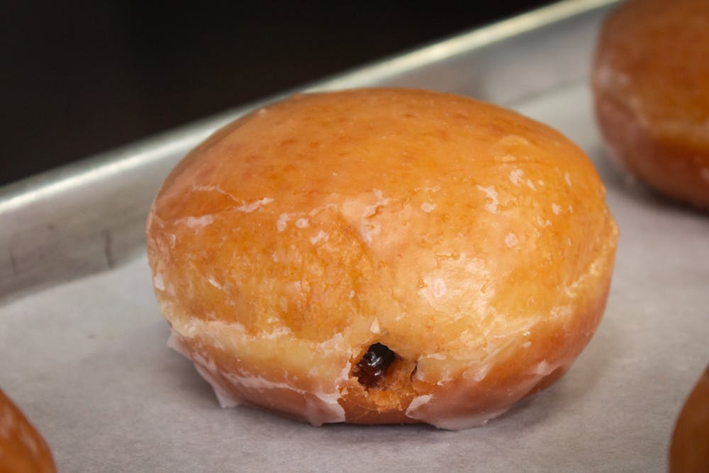 a close up of a doughnut sitting on a table