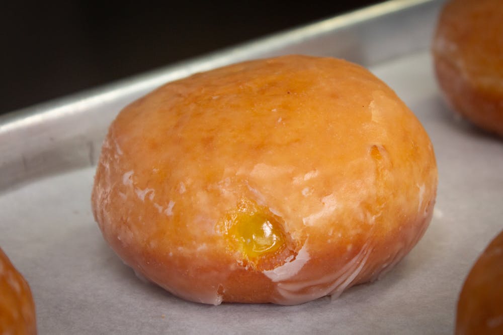 a close up of a doughnut sitting on a table