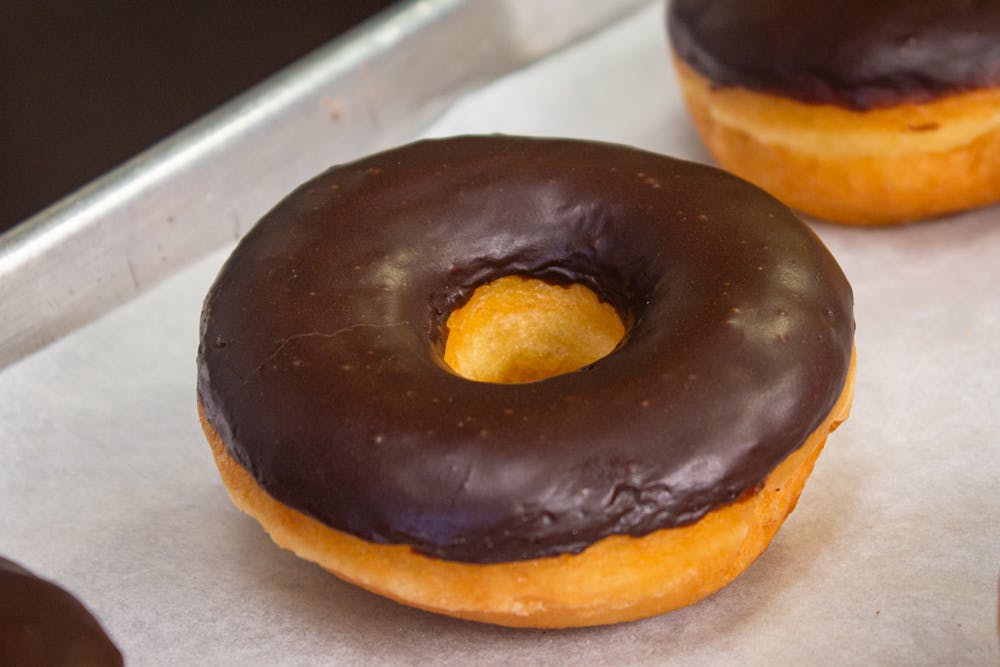 a close up of a doughnut sitting on a table