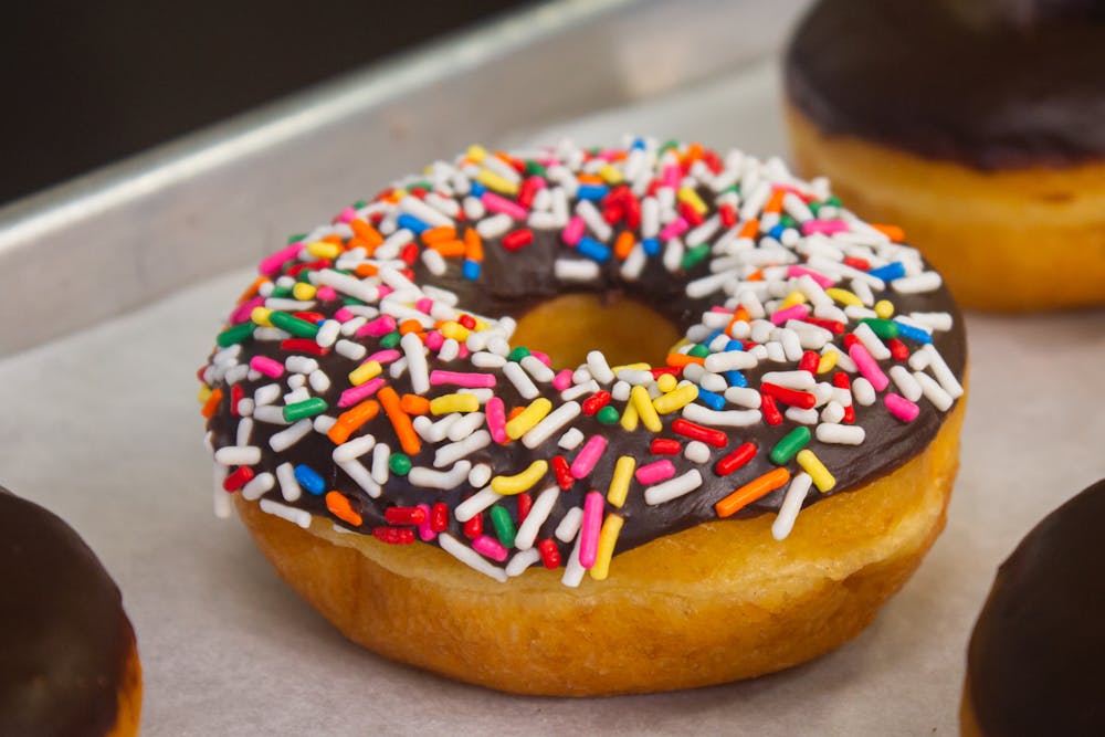 a close up of a box of donuts
