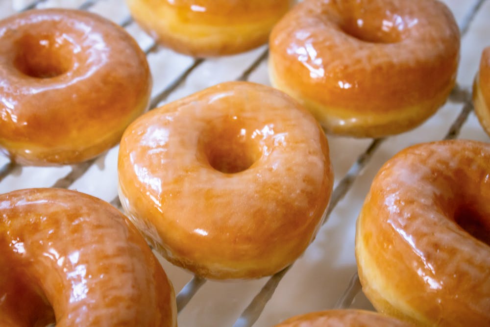 a box filled with different kinds of donuts