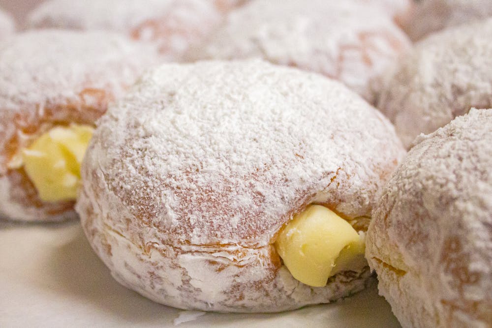 a close up of a piece of cake covered in snow