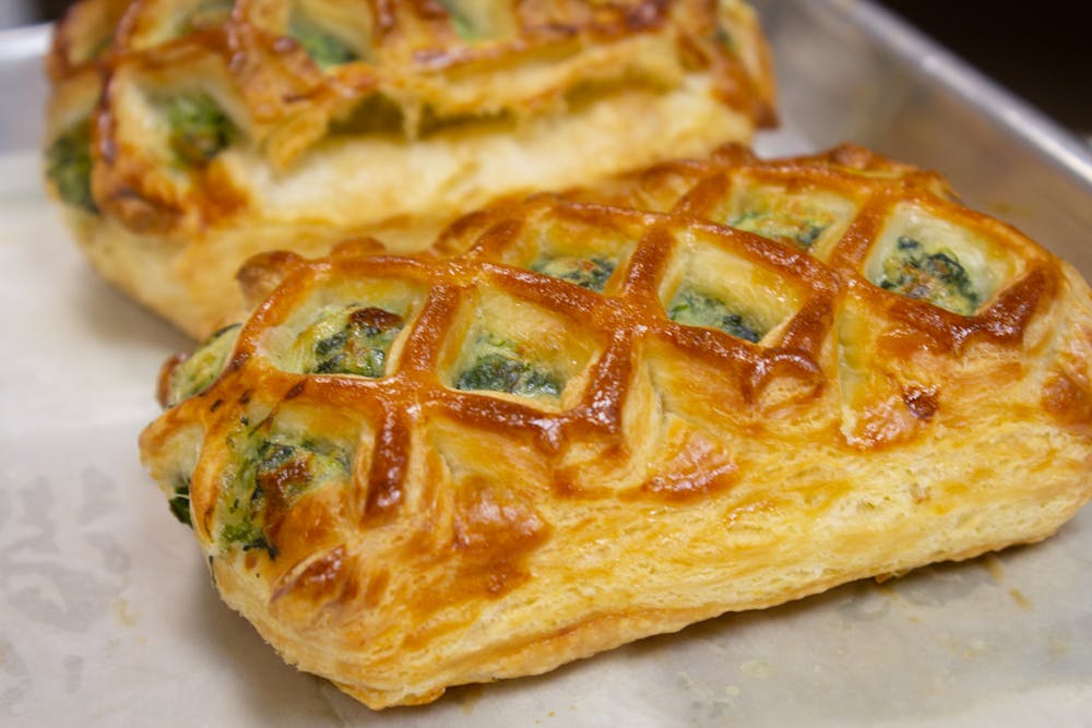 a close up of a slice of pizza