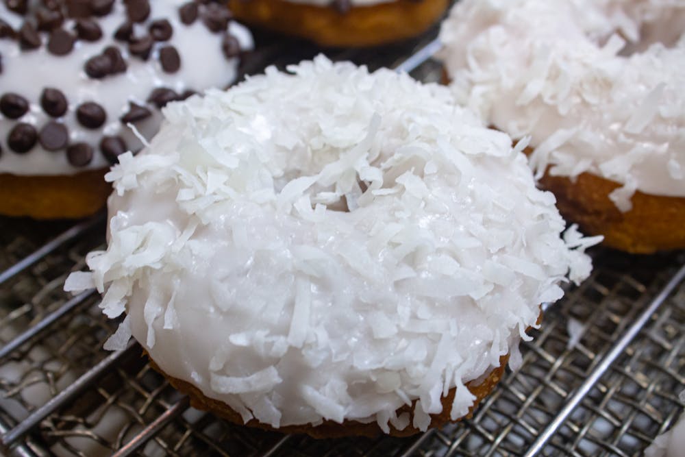 a cake sitting on top of rice on a plate