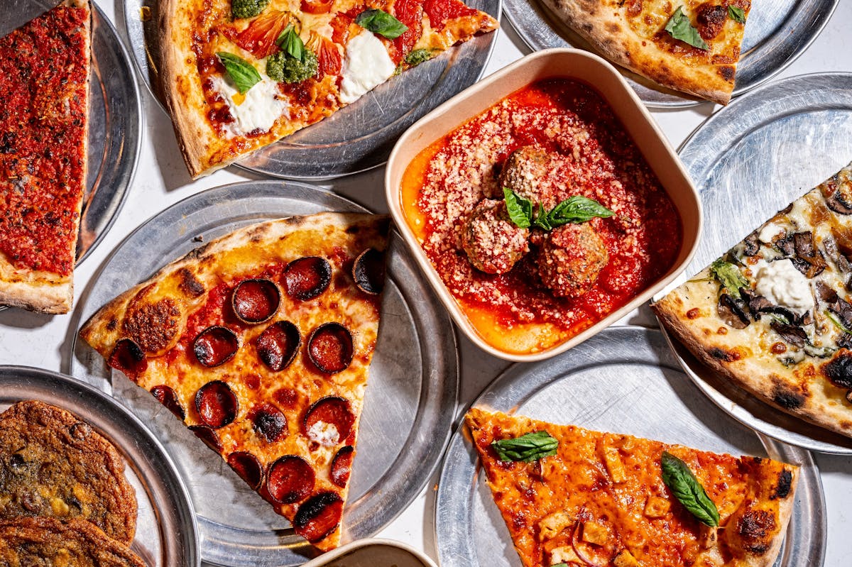 a box filled with different types of food on a plate