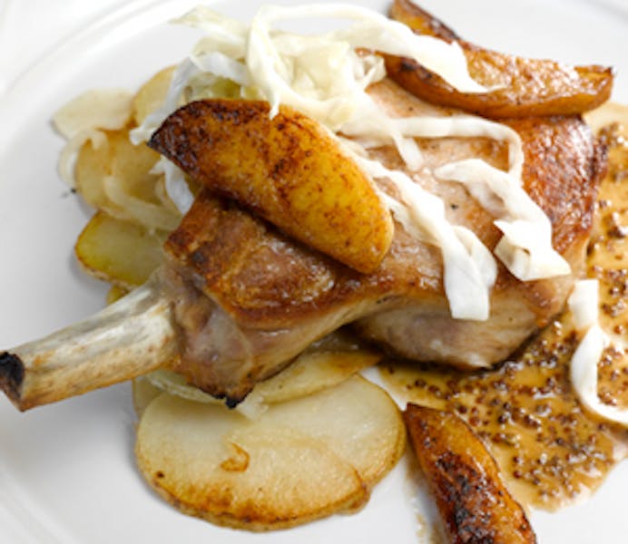 From the Kitchen Sautéed Pork Chop, OnionApple Ragoût, Mustard Jus the girl & the fig