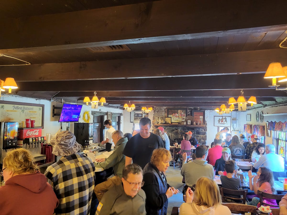 a group of people standing in a room