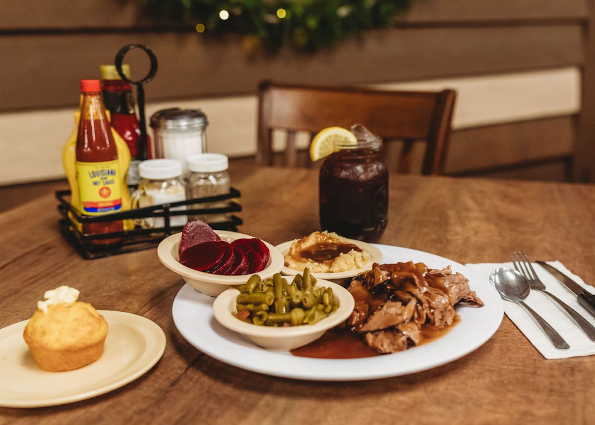 a table topped with plates of food on a plate