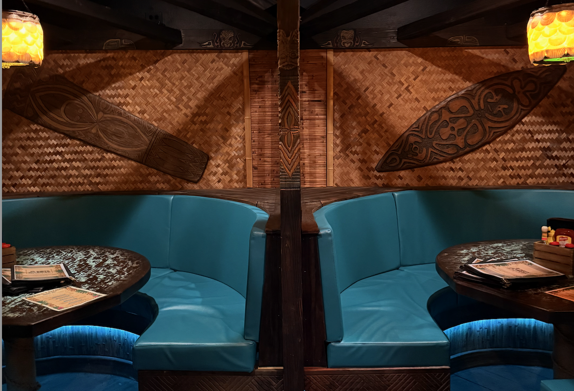 Private tiki booths inside The Roost at Dirty Birds Tiki Bar & Grill in Cocoa Beach, Florida.