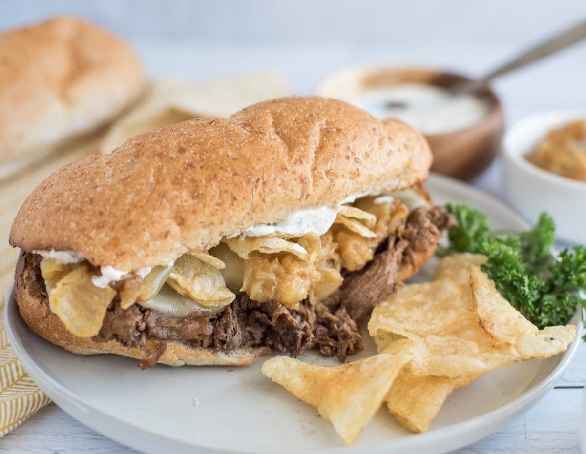 a sandwich cut in half on a plate
