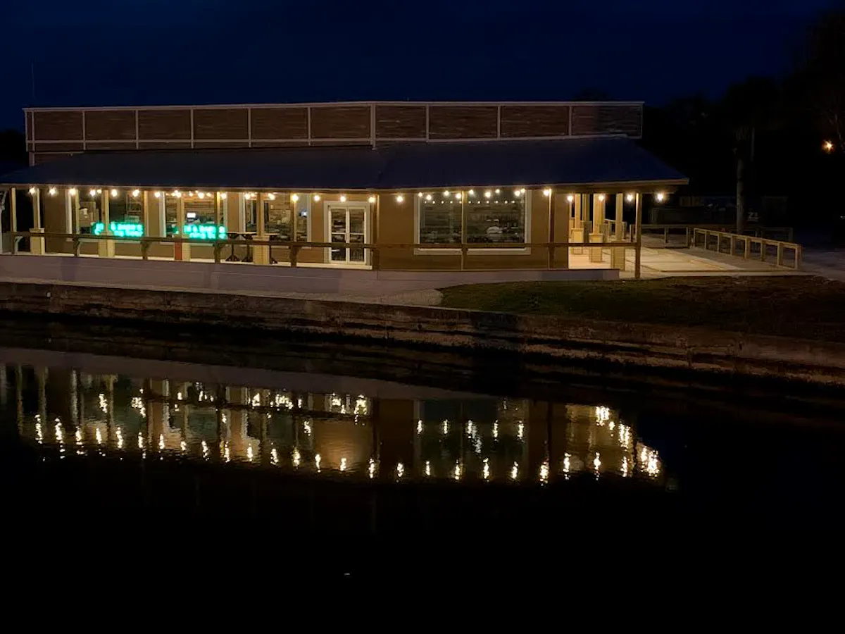 a large bridge lit up at night