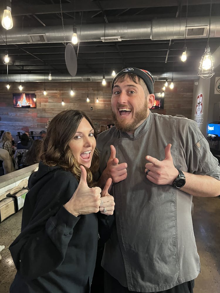 a man and a woman posing for a picture