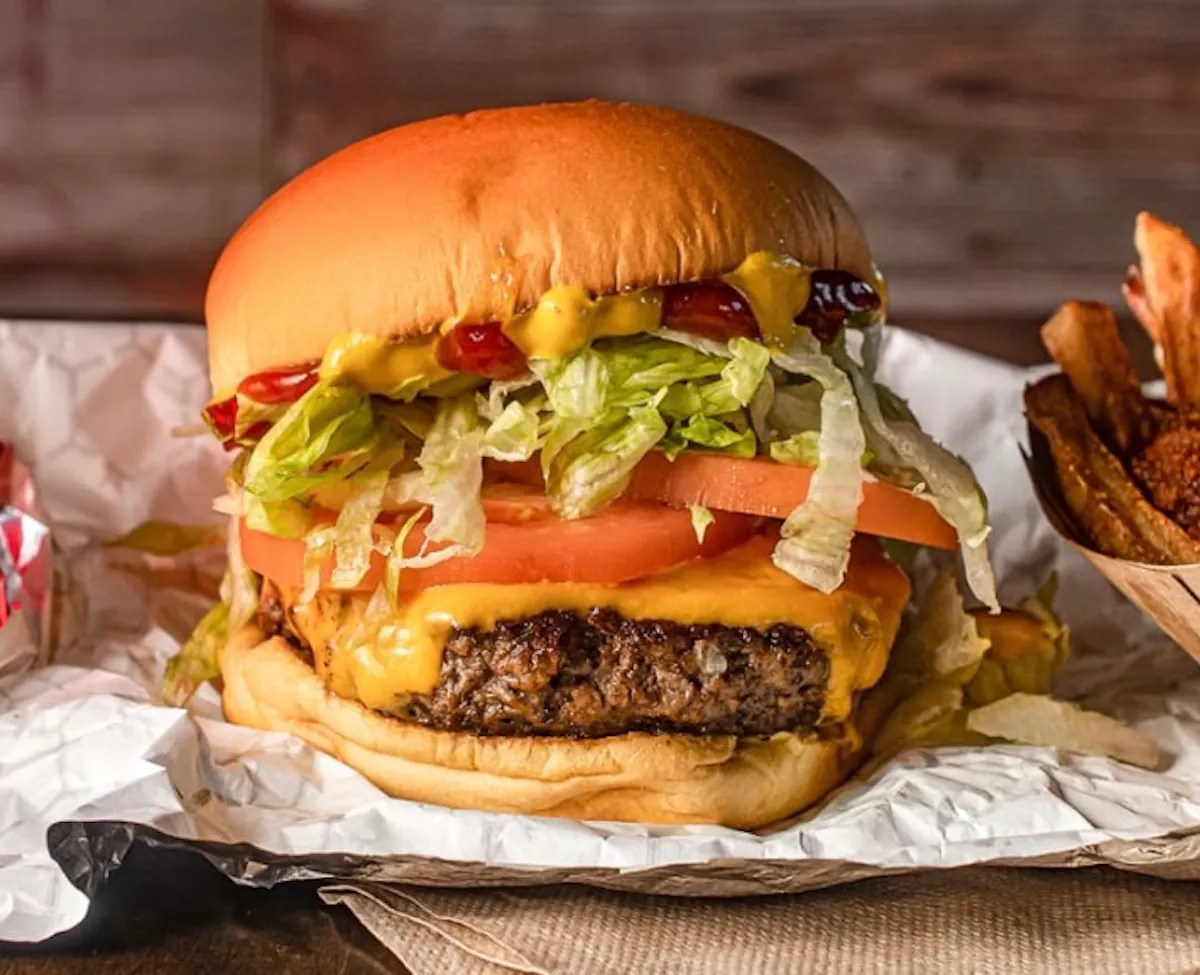 a burger sitting on top of a table