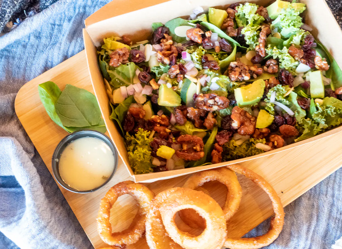 a box filled with different types of food on a table