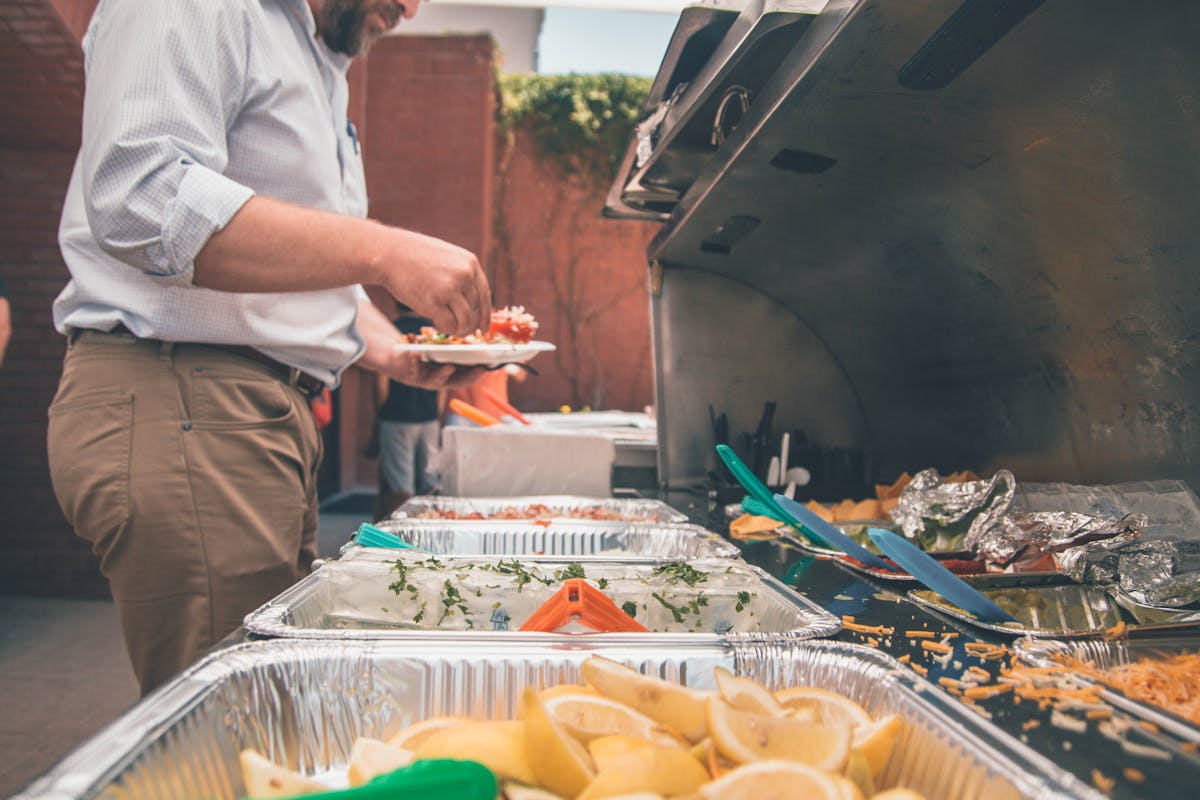 a man cutting food on a table