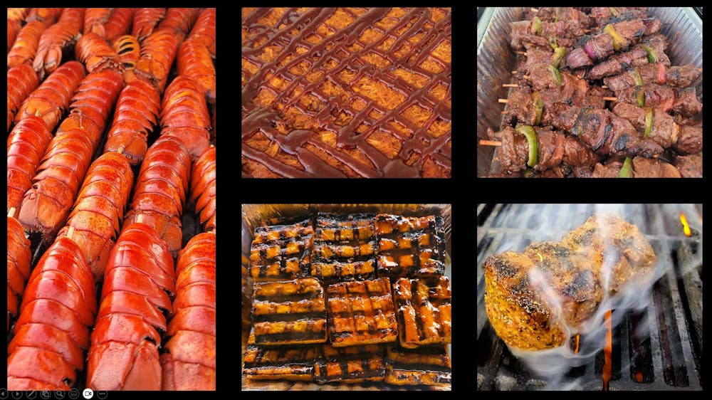 a bunch of hot dogs on a grill