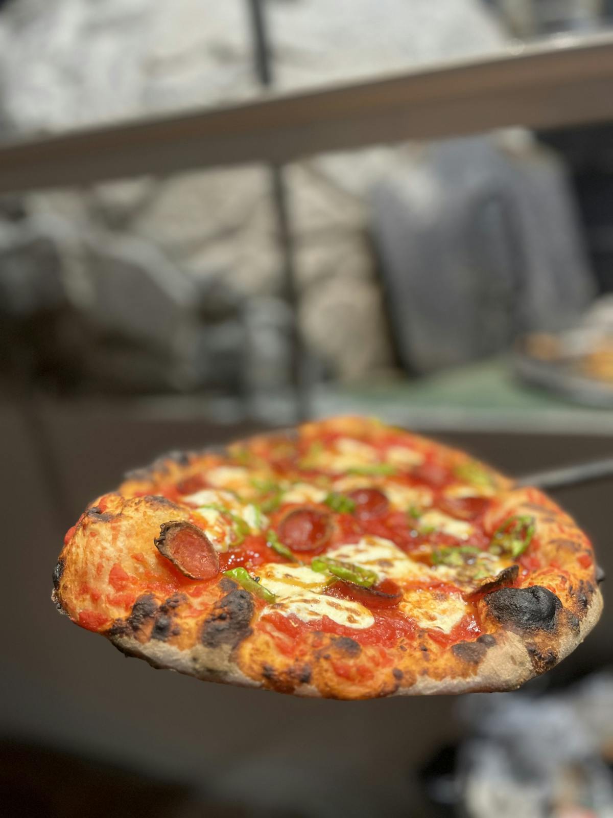 Pizza taken off the oven