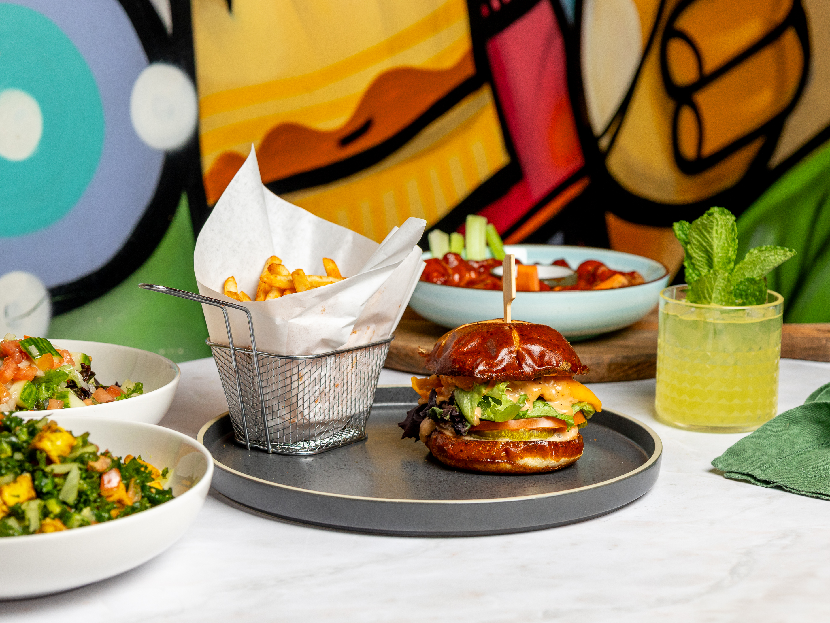 a plate of food sitting on top of a wooden table