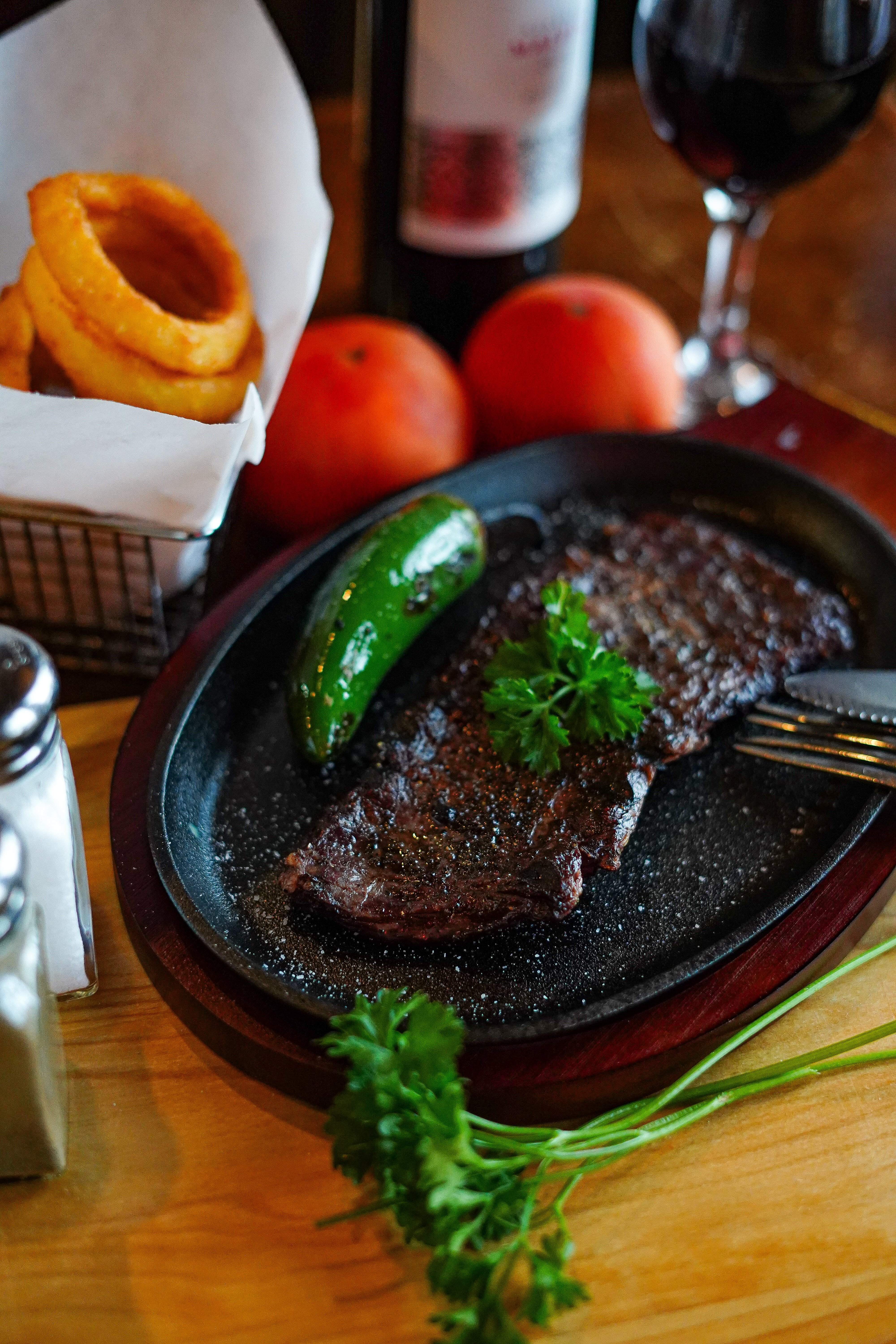 a plate of food on a wooden table