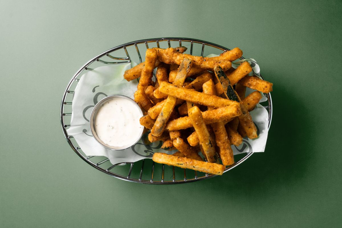 Zucchini fries with house-made ranch on the happy hour menu at 1983 in Tampa