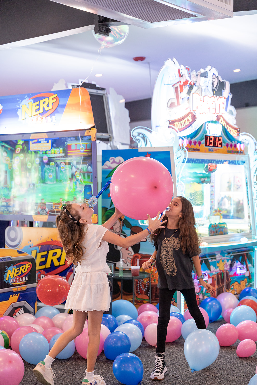 a group of stuffed animals on display in a store
