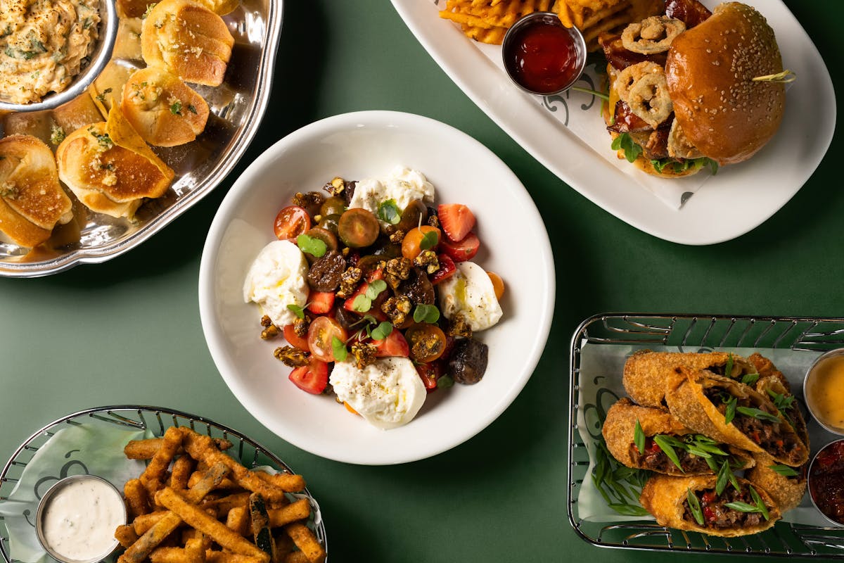a bowl filled with different types of food on a plate