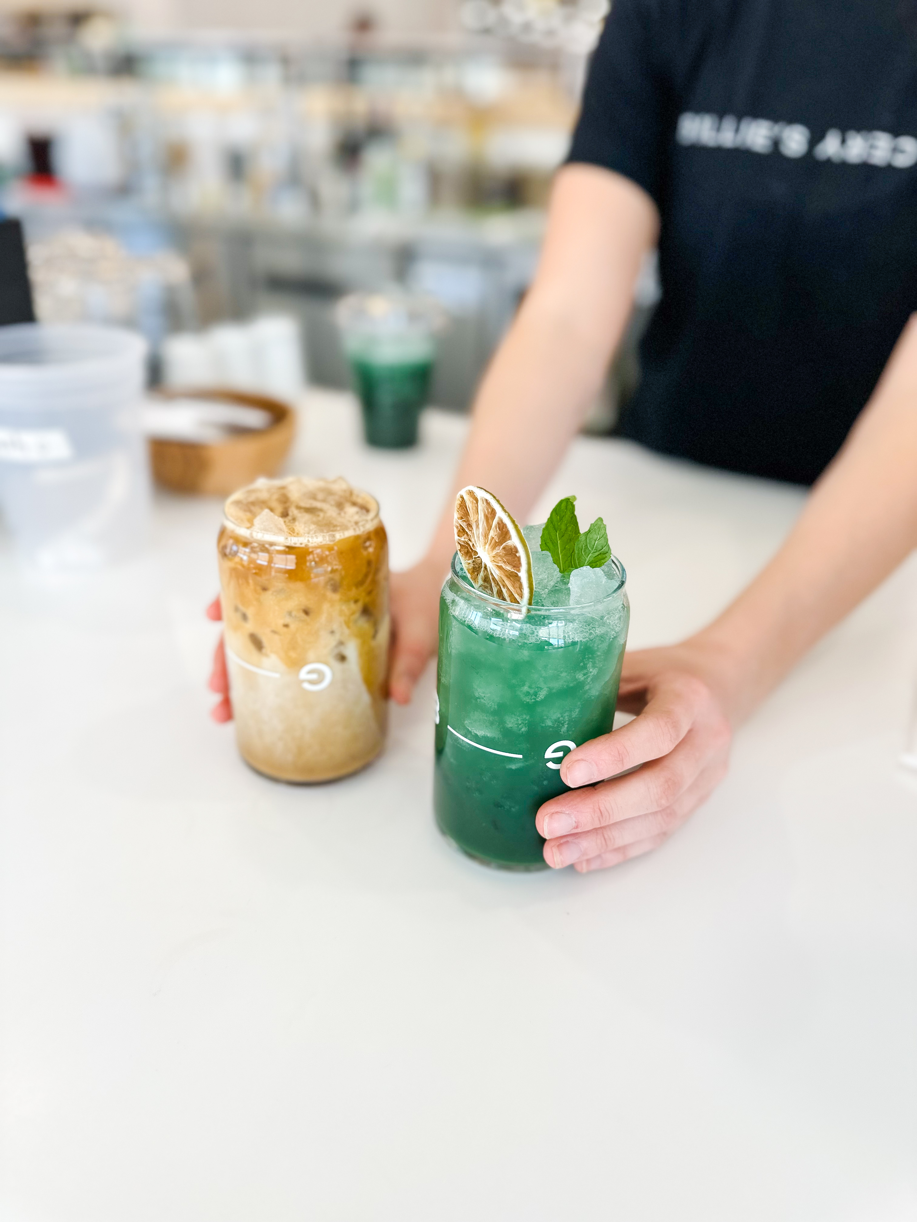a person sitting at a table eating food
