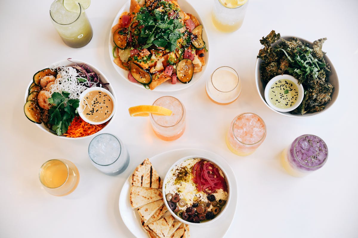 a table topped with different types of food on a plate