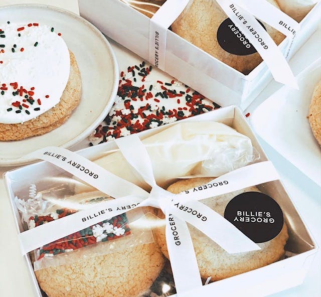a box filled with different types of food on a plate