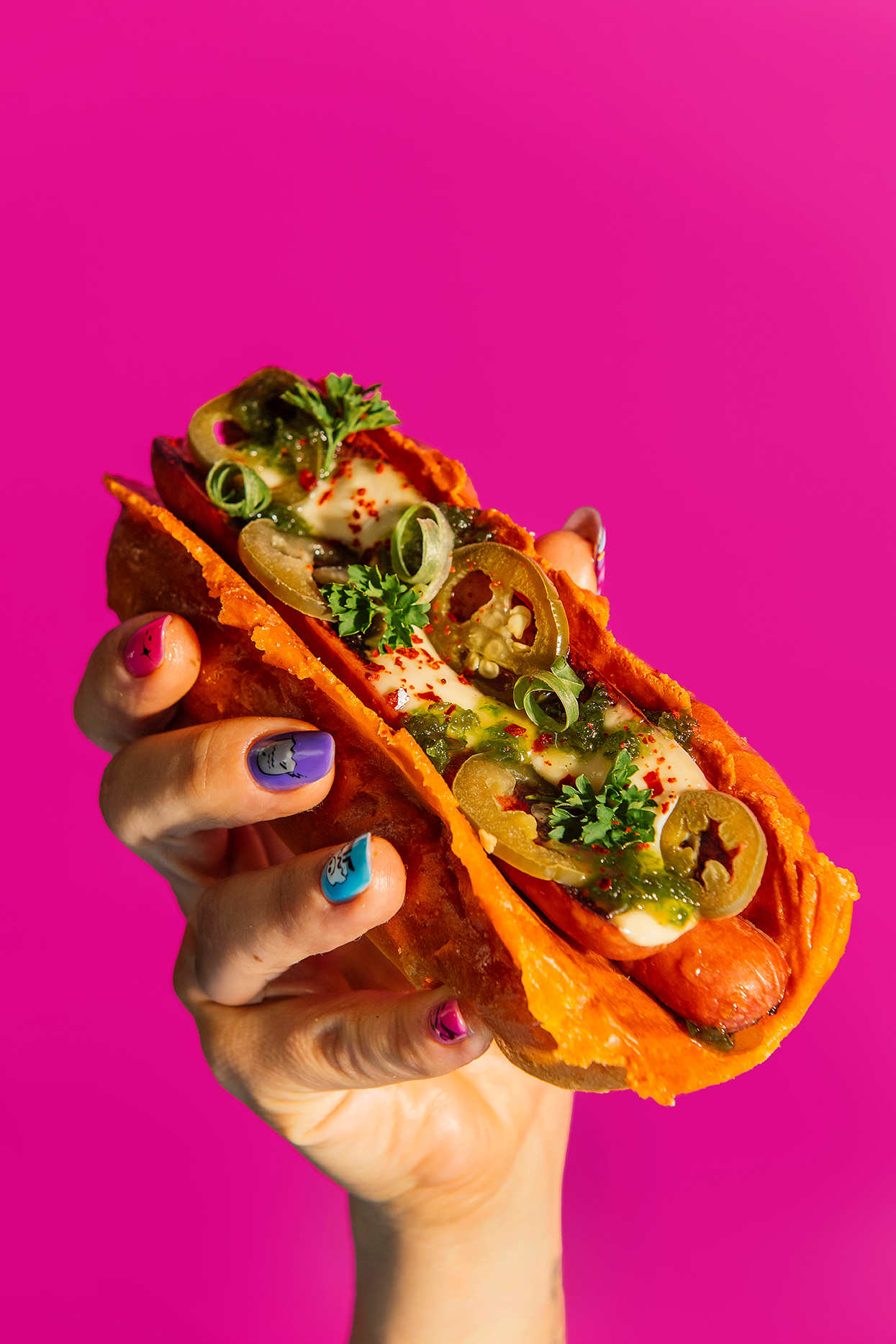 a close up of a person holding food