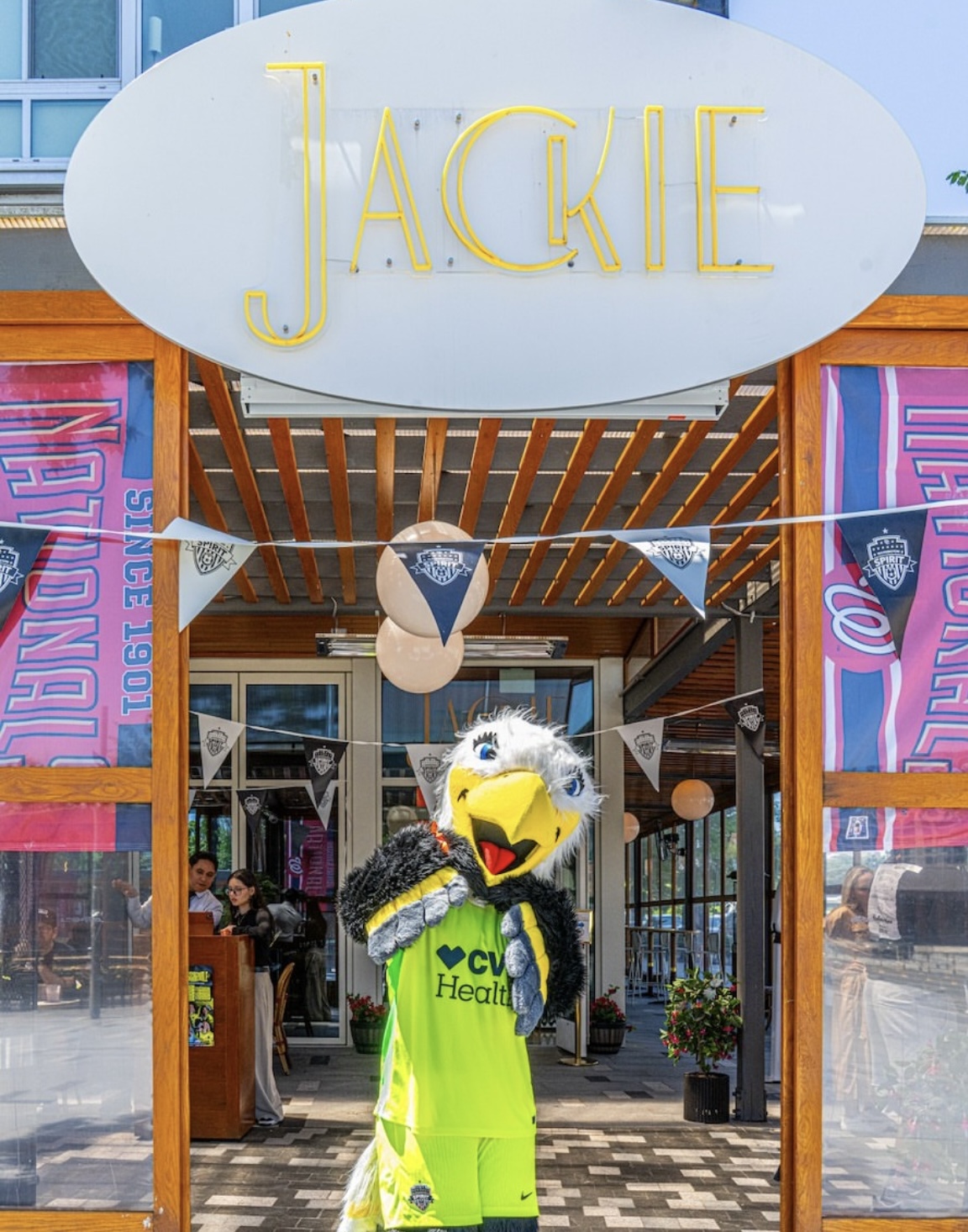 a person standing in front of a building