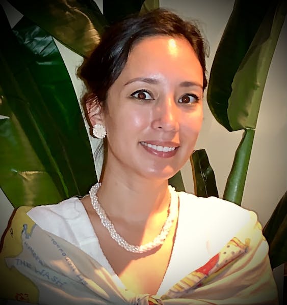 a woman smiling for the camera