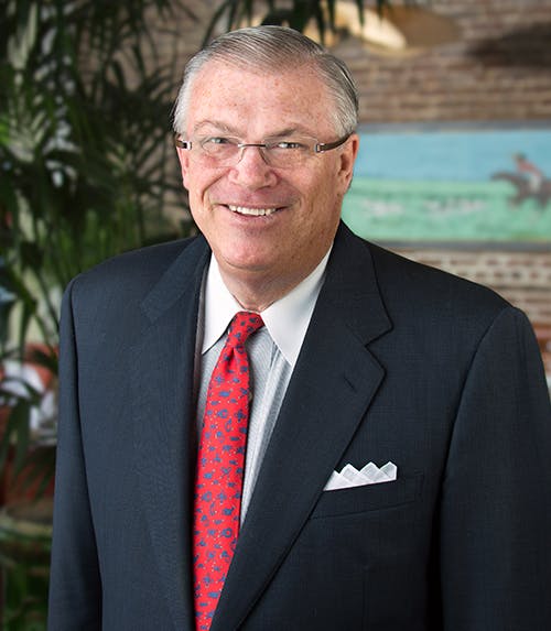 a man wearing a suit and tie