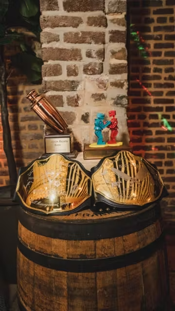 a vase sitting on top of a barrel