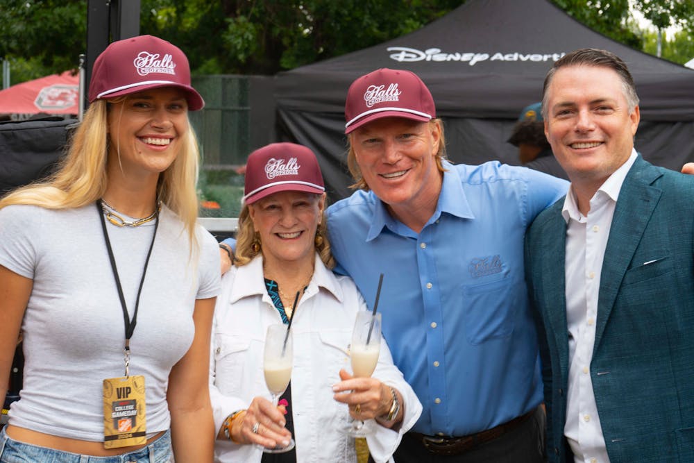 a group of people posing for the camera