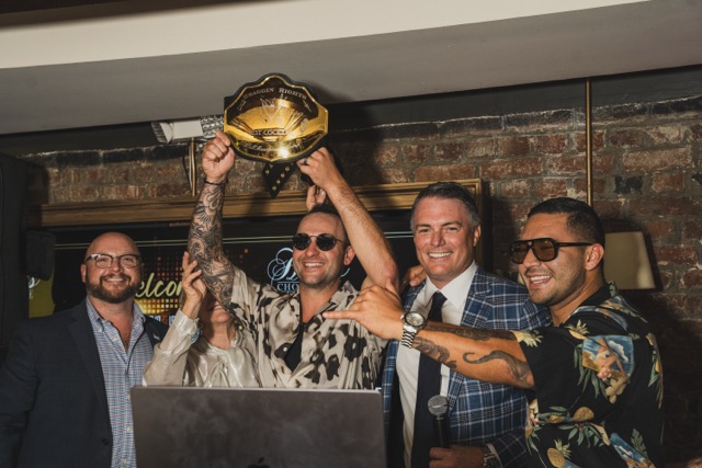 a group of people posing for the camera