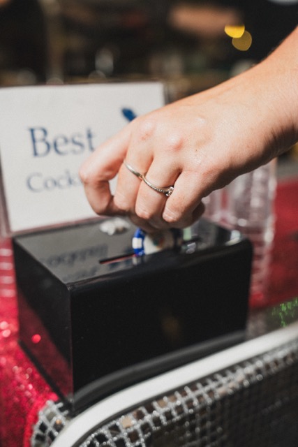 a hand holding a cell phone