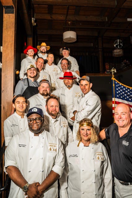 a group of people posing for a photo