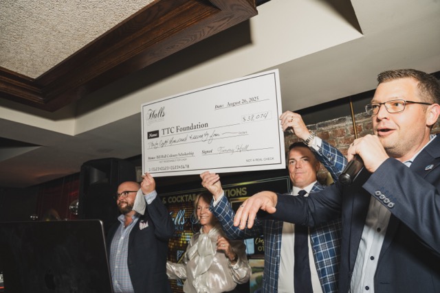a group of people standing in a room