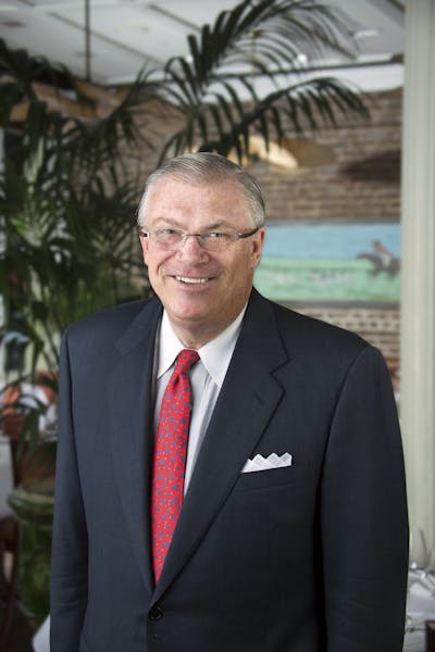 a man wearing a suit and tie