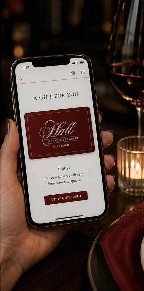 a hand holding a cell phone