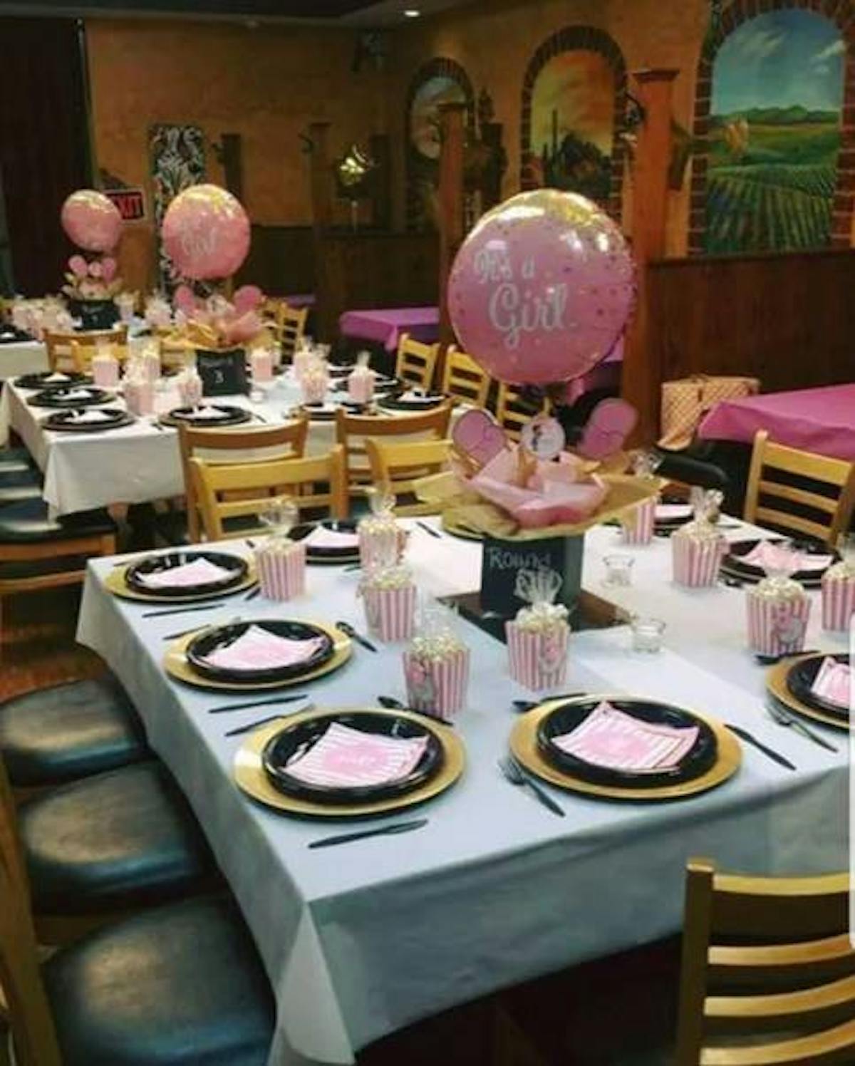 a table decorated with pink
