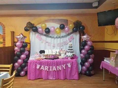 a baby shower decorated table