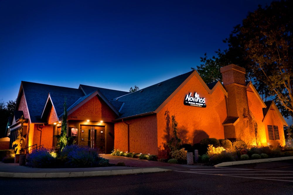 a close up of a street in front of a house