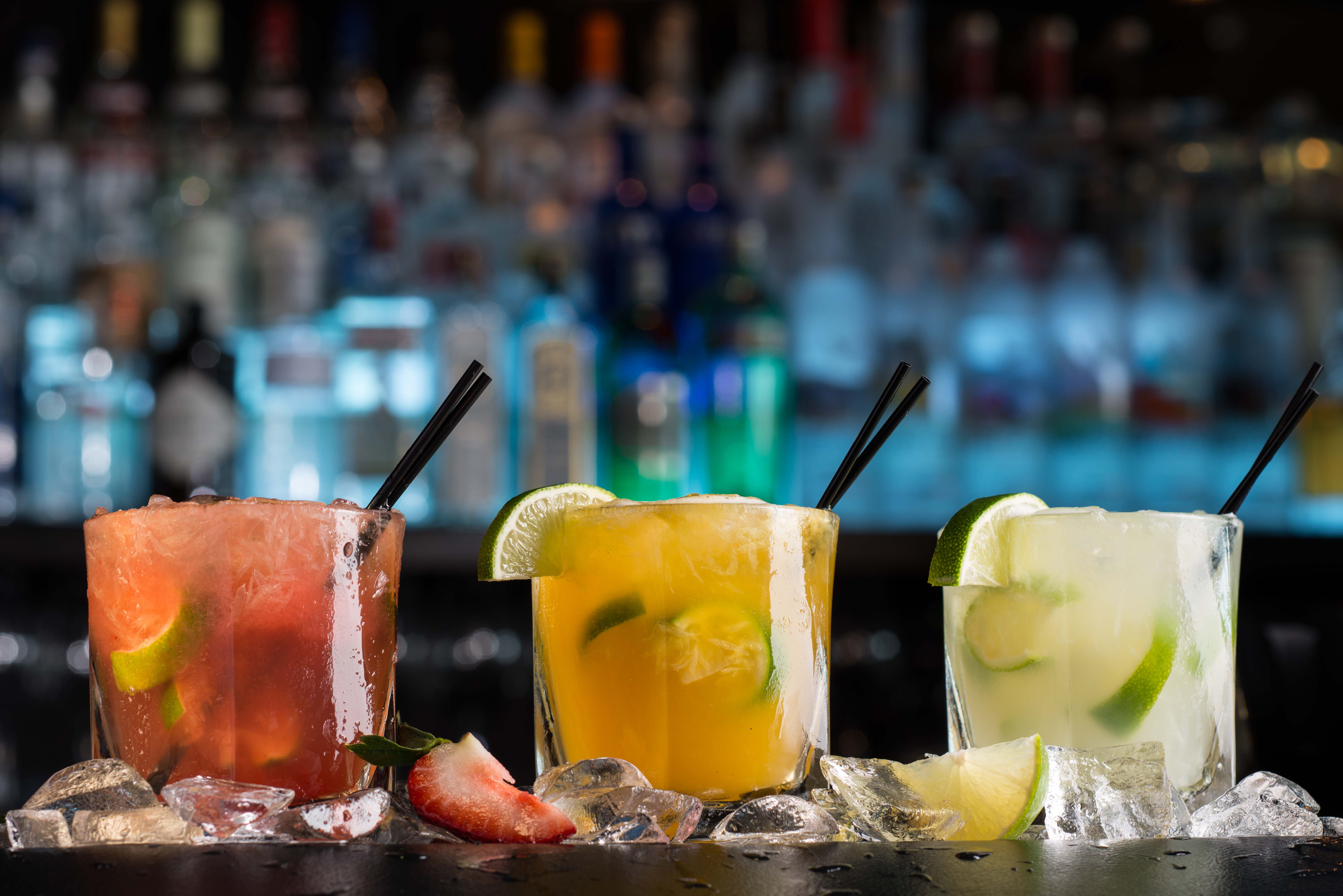 a close up of a glass of orange juice