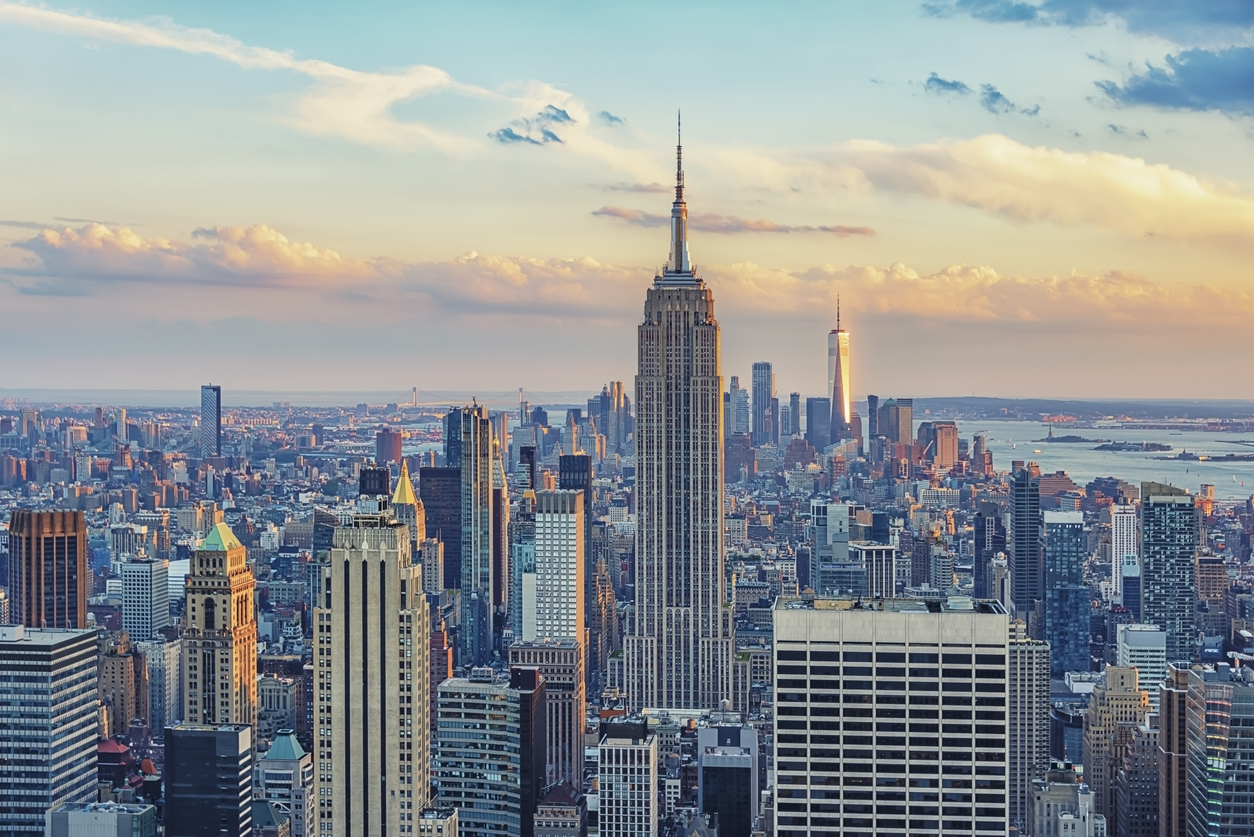 a city skyline with tall buildings